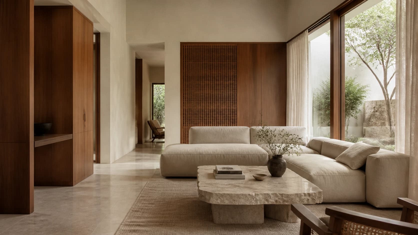 AI-generated living room concept with linen seating, limestone flooring, warm teak and courtyard greenery. Not a completed studio project.